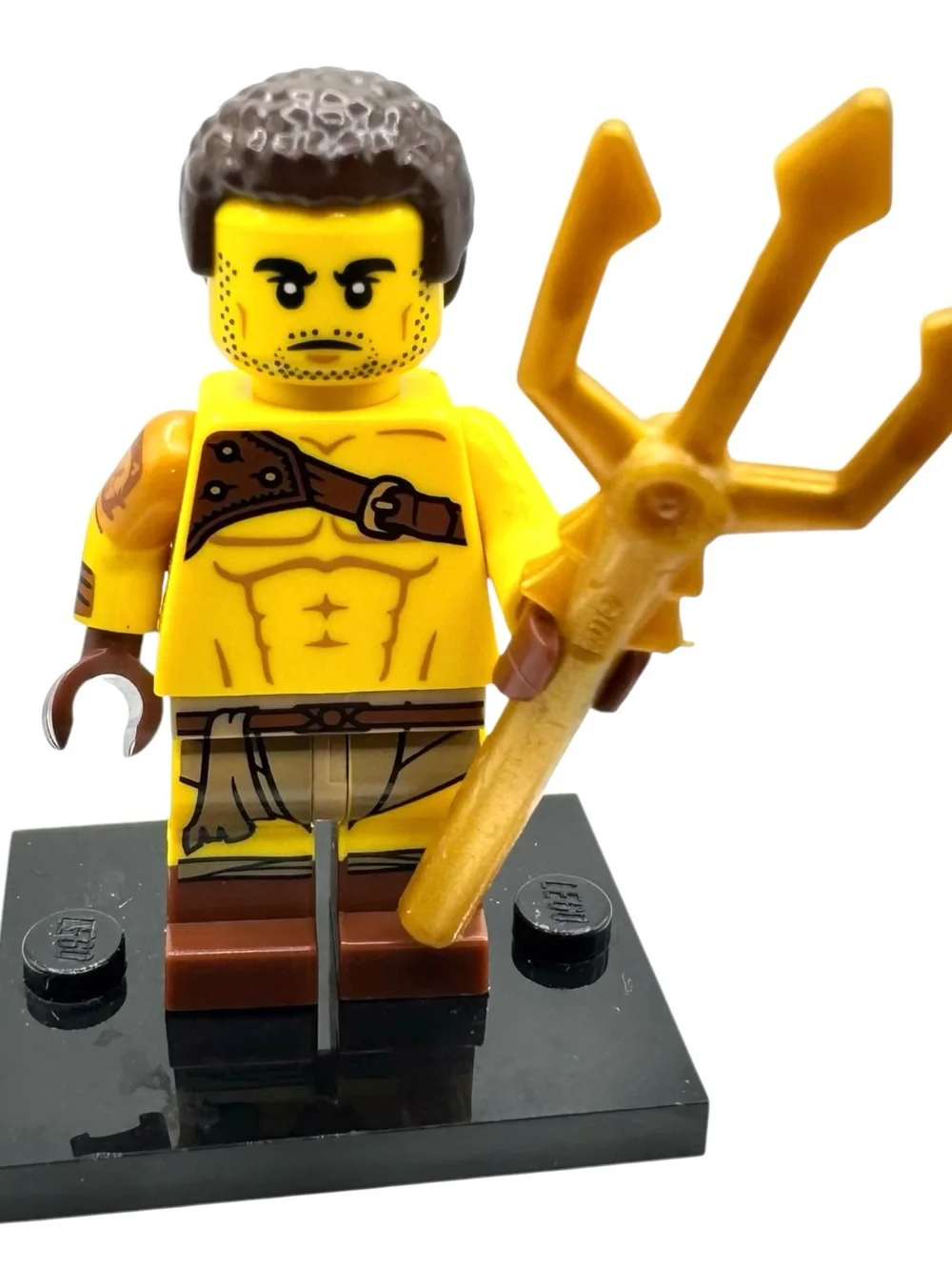 Lego Yellow Minifigure with Brown Hair and Gold Trident